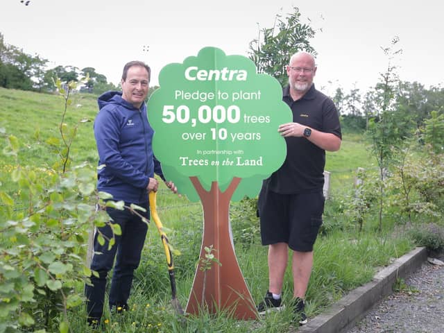 2.	Centra Crossmaglen owner Colm Devlin (right) visits Culloville Blues GAC and meets coach and secretary Terence McCreesh. The club has received 130 native trees, shrubs and fruit trees through the Centra and Trees on the Land project.