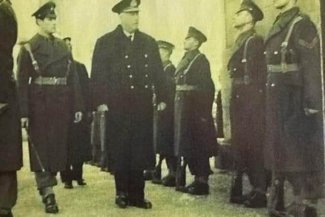 Captain John Gough, left, on duty in Hillsborough, residence of the Governor of Northern Ireland, after the war.