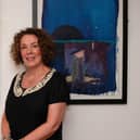 Anna Marie Savage pictured with her work at Newry and Mourne Museum. Newry and Mourne Museum Collection