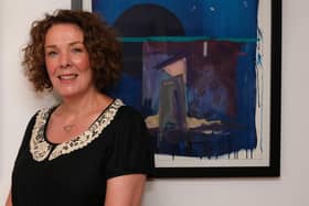 Anna Marie Savage pictured with her work at Newry and Mourne Museum. Newry and Mourne Museum Collection