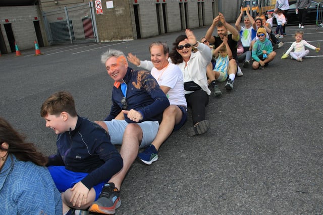 Great Fun as everyone got down on the street and took part in Rock The Boat. INNR3949