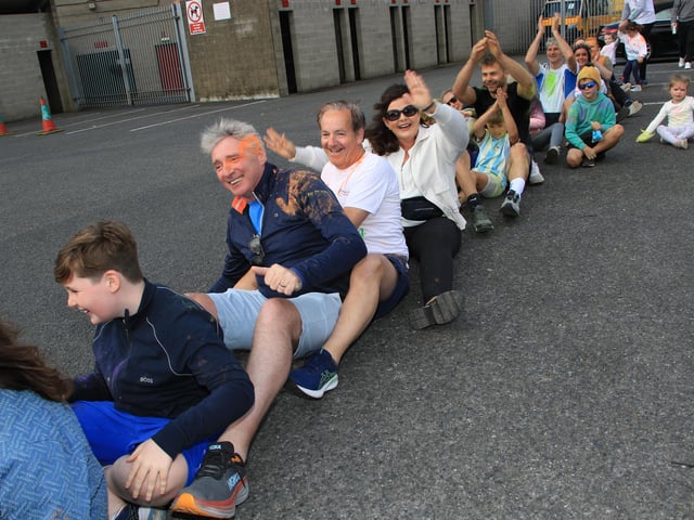 Great Fun as everyone got down on the street and took part in Rock The Boat. INNR3949