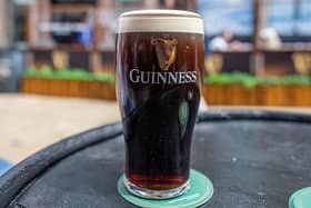A freshly poured pint of Guinness. Photo by PAUL FAITH/AFP via Getty Images