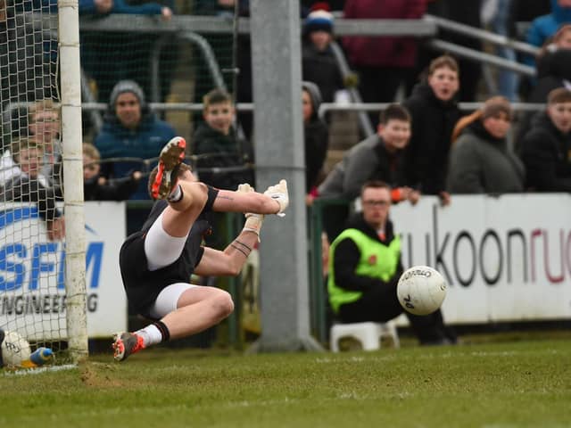 Armagh's Blaine Hughes saves a Donegal penalty.