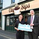 Finance Minister John O’Dowd MLA with City Sips Café owner Caoimhe Meehan.