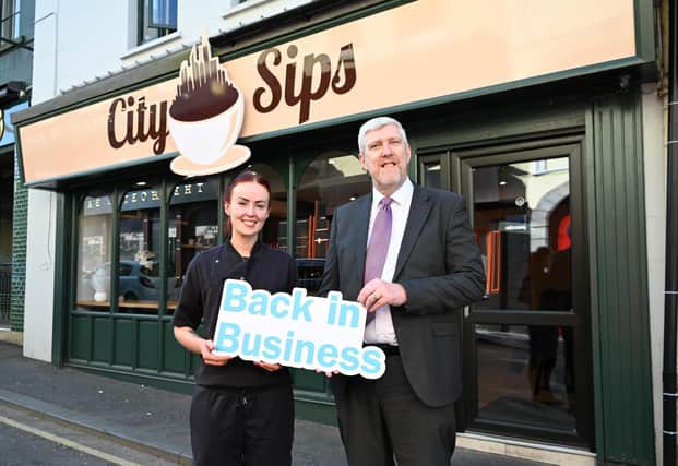 Finance Minister John O’Dowd MLA with City Sips Café owner Caoimhe Meehan.