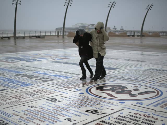 Walkers battle stormy weather.
