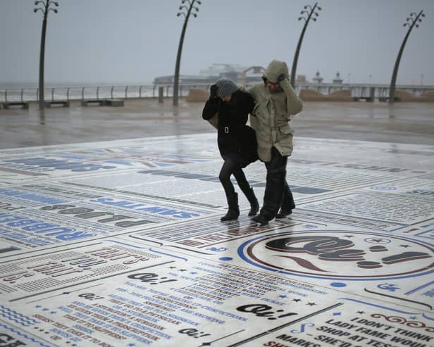 Walkers battle stormy weather.