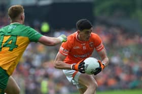 Armagh's Rory Grugan with Donegal's Oisin Gallen