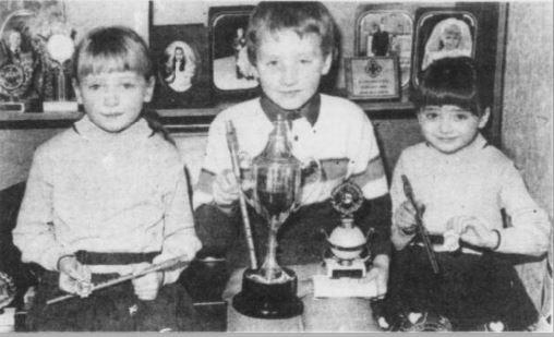 Ciaran Murphy, centre, winner of the Sean Gallagher Memorial Cup for Most Promising Young Tin Whistle Player at Forkhill INF Feis. On left is Michelle Murphy, one of the members of the Ceili Band which came second in their section and Catrina Murphy, right, who was third in the under-12 tin whistle section. They are the son and daughters of Jim and Theresa Murphy, Regina Park, Jonesborough.