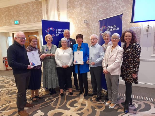 Members of Newry Cancer Research accompanied by Castlederg Research Committee Group with Cancer Research UK - Northern Ireland Area Manager Lisa Bailey. Missing from the photo were Gervase McCartan, Bernie Ward, Cora Trainor and Paddy O'Hanlon.