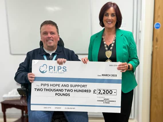 Edwina Flynn, President of Newry Chamber of Commerce and Trade and PIPS' Fundraising, Marketing & Communications Manager, Padraig Harte
