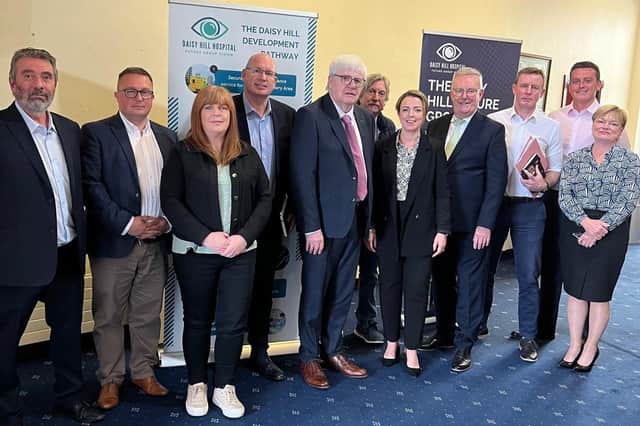 Members of the Daisy Hill Future Group with Health Minister Mike Nesbitt.