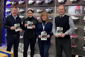 Launching the Lurgan Park Fun Run for Southern Area Hospice 2024 are L-R Tony Mckeown, Event Organiser, Louise Doone, Store Manager, McKeever Sports, Deirdre Breen, Lurgan Friends of Hospice, and David Wilson, Event Organiser