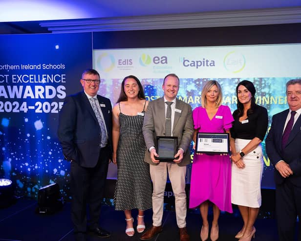 Helen Doherty, Vice Principal of winning St Coleman’s College in Newry pictured with colleagues Anna Carr, Michael Fegan and Rosemary Matthews alongside EA Chair Mervyn Storey and DE Permanent Secretary, Ronnie Armour