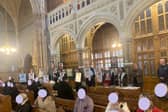 The protest takes place during Mass in St Patrick's Cathedral in Armagh.