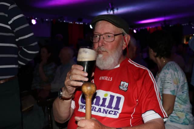 PINT - The Sands Family in concert and a cool pint of Guinness. What more could a man want? Jim Humphries from Devon has been coming to the Fiddler's Green Festival for 19 years with his wife Sue and both are big fans of the Sands.