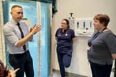 Chris Hazzard MP talking to staff at Daisy Hill.