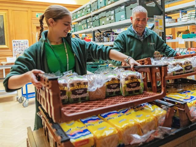 Volunteers pack emergency food parcels