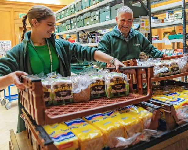 Volunteers pack emergency food parcels