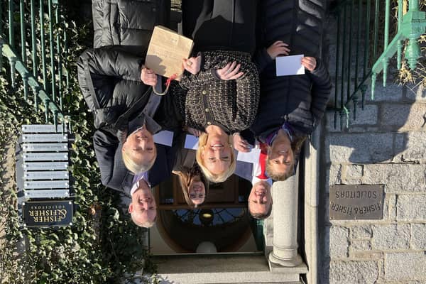 Pictured at the Fisher & Fisher 125th anniversary voucher launch is (left to right, front) Fiona Downey, Friar Tucks, Sugar Island; Jacqueline Malone, Fisher & Fisher Solicitors; Karen Sherwin, George Preston Florist; (back) Alastair Harvey, Gordons Chemists; Linda Wright, Fisher & Fisher; and Eamonn Connolly, Newry BID Manager.