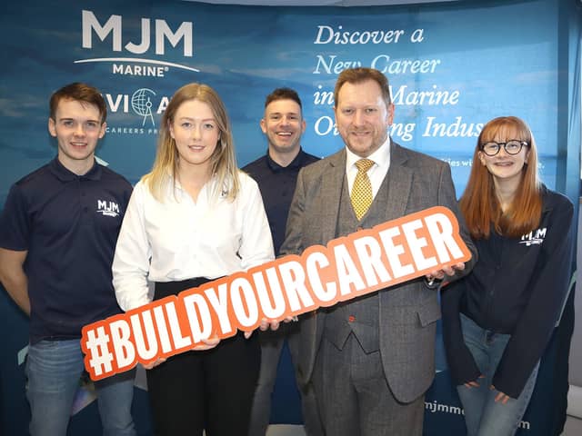 Helping students to consider ‘Build Your Career’ a future in construction from MJM Marine, were, from left: Shae Rooney, Louise McCooey, Barry Neilson OBE CITB NI, Anthony Brennan and Faith Elliott.