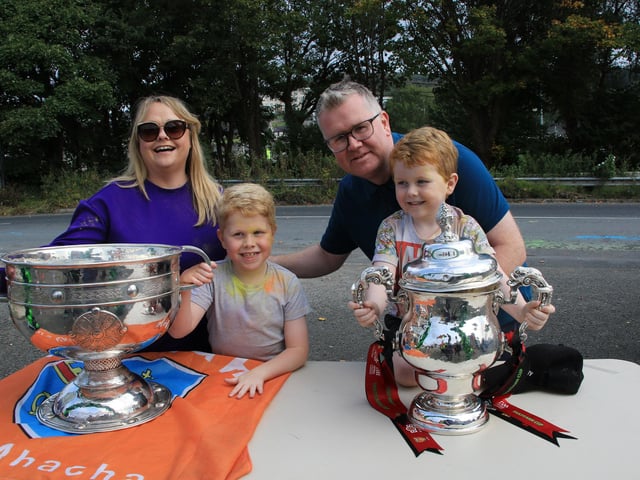 The Lavery family took the opportunity to get a photograph with the Sam Maguire and Tailteann Cups on display. INNR3954