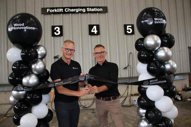 Cutting the ribbon at Wood Innovations, Dan McCreanor and Philip Martin. INNR2856