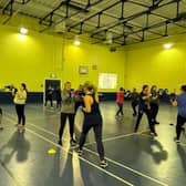 Damolly and Ashgrove Rovers Women's Social Football teams undertake a boxing course as part of International Women's Week.
