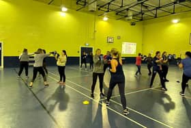Damolly and Ashgrove Rovers Women's Social Football teams undertake a boxing course as part of International Women's Week.