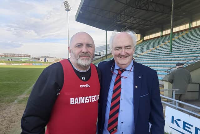 Ronan Sheehan pictured with Down GAA Secretary Sean Og McAteer.