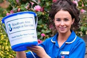 A Hospice nurse is pictured launching the ‘Big Bucket Collection’ which will take place on Friday, March 21 throughout the majority of towns in Southern Health Trust area.