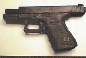 A pistol which was uncovered during the search in Crossmaglen last October.