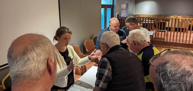 Liz Kimmins MLA talks to residents during the meeting in Cloughogue.