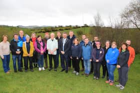 Deputy Chairperson of Newry, Mourne and Down Council, Councillor Gareth Sharvin, John McCombe Owner the Turnip, with tourism business representatives and staff from the Joyce Country and Western Lakes and Mourne Gullion Strangford Geoparks who came together in knowledge exchange trips funded by the Shared Island Civic Society Fund. The group pictured at the Turnip House Café and Craft Outlet situated in the Mournes an Area of Outstanding Natural Beauty with stunning views over the landscape.