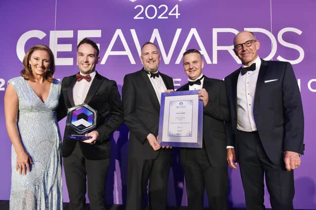 The team from Felix O'Hare celebrating winning the Overall Award at the 25th CEF Excellence Awards for Riddel Hall Management School, Queen’s University Belfast along with Awards Hosts Claire McCollum and Phil Spencer and David Thompson from Awards Headline Sponsor, CIS/Glenigan
