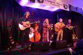 FAMOUS - The famous Sands Family on stage last weekend at the Fiddlers Green Festival in Rostrevor are (from left) Colum. Anne, Tommy and Ben.