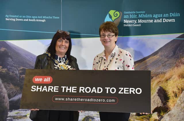 Newry, Mourne and Down District Council Chairperson, Councillor Valerie Harte (left) supports the ‘Share the Road to Zero’ pledge with Julie Thompson, Deputy Secretary in the Department for Infrastructure.