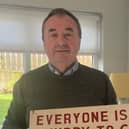 Pat McGinn with the original detox unit sign that would have greeted all residents in Cuan Mhuire 40 years ago.