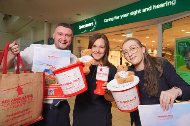 Johnny Cochrane, Hannah Fisher and Teenie Kinney from Specsavers Newry celebrate the store’s new fundraising partnership with Air Ambulance NI.