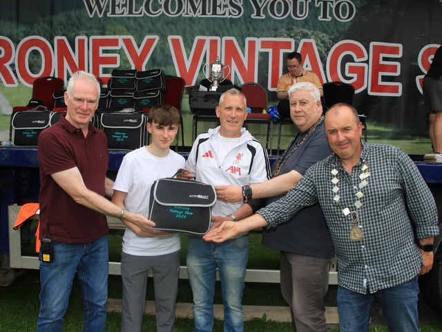 Aidan and Odhran McCabe accepted their prize for Tractor of the Show his Ford 8210 MT3 from Garett Fitzgerald Chairperson Kilbroney Show Committee, Council Chairperson, Councillor Glyn Hanna and Thomas Braham President Newry Lions. INNR2530