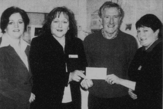 Pictured presenting a cheque for £2,000 to Fiona Stephens of Southern Area Hospice Services are Syd Cully and staff of Moy Park. The money was raised at a recent raffle.