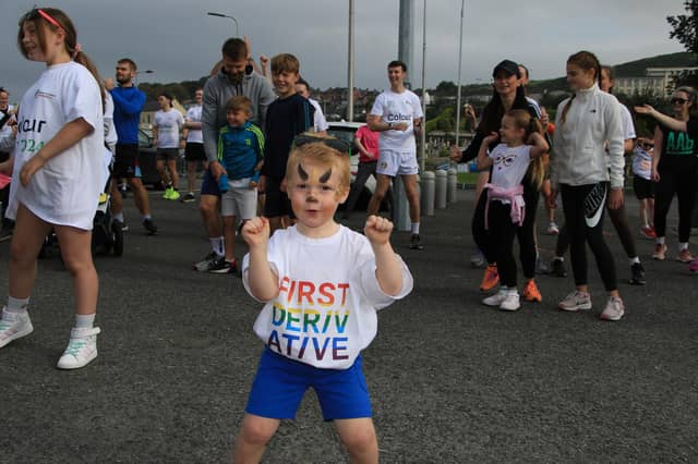This young man just loving the music and can't wait to get started in the Colour Run. INNR3939