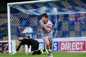 Lorcan Forde celebrates his opening goal against Glenavon in their August 2023 meeting at Mourneview Park.