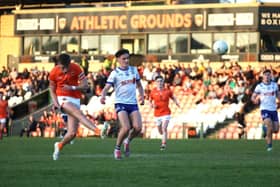 Michael McSorely fires over for Armagh U20s against Monaghan. Pics: Ulster GAA