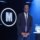 Host  Clive Myrie with Mastermind trophy