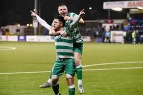 Neil Barr and Jack O'Doherty celebrate Barr's decisive second half goal against Lincoln Courts during Cleary Celtic's 2-0 Junior Cup semi-final victory at Stangmore Park.