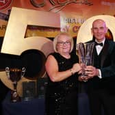 Hugh Morgan presented on  behalf of the Morgan Family their Trophy in memory of their sister Bridget to Ann Quinn who has given exceptional service to Gateway Club. INNR4852:.