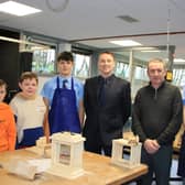 Michael McLaughlin and  Michael O'Hanlon Technology Department with pupils Nathan and Thomas showing visitors how to make their clock. INNR0321