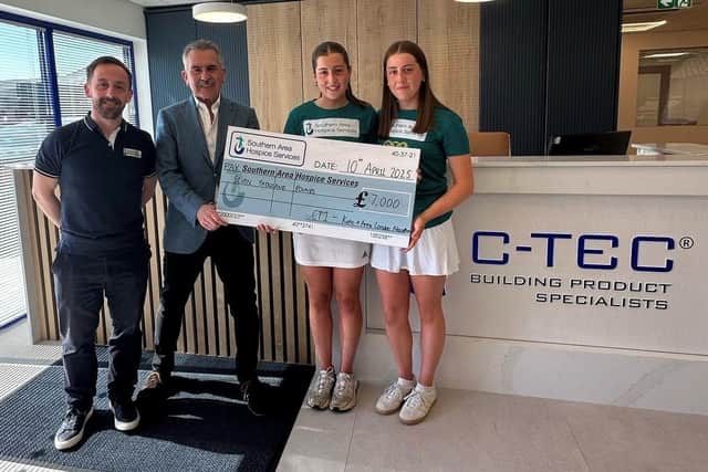 CT1 make a donation to Katie and Anna.